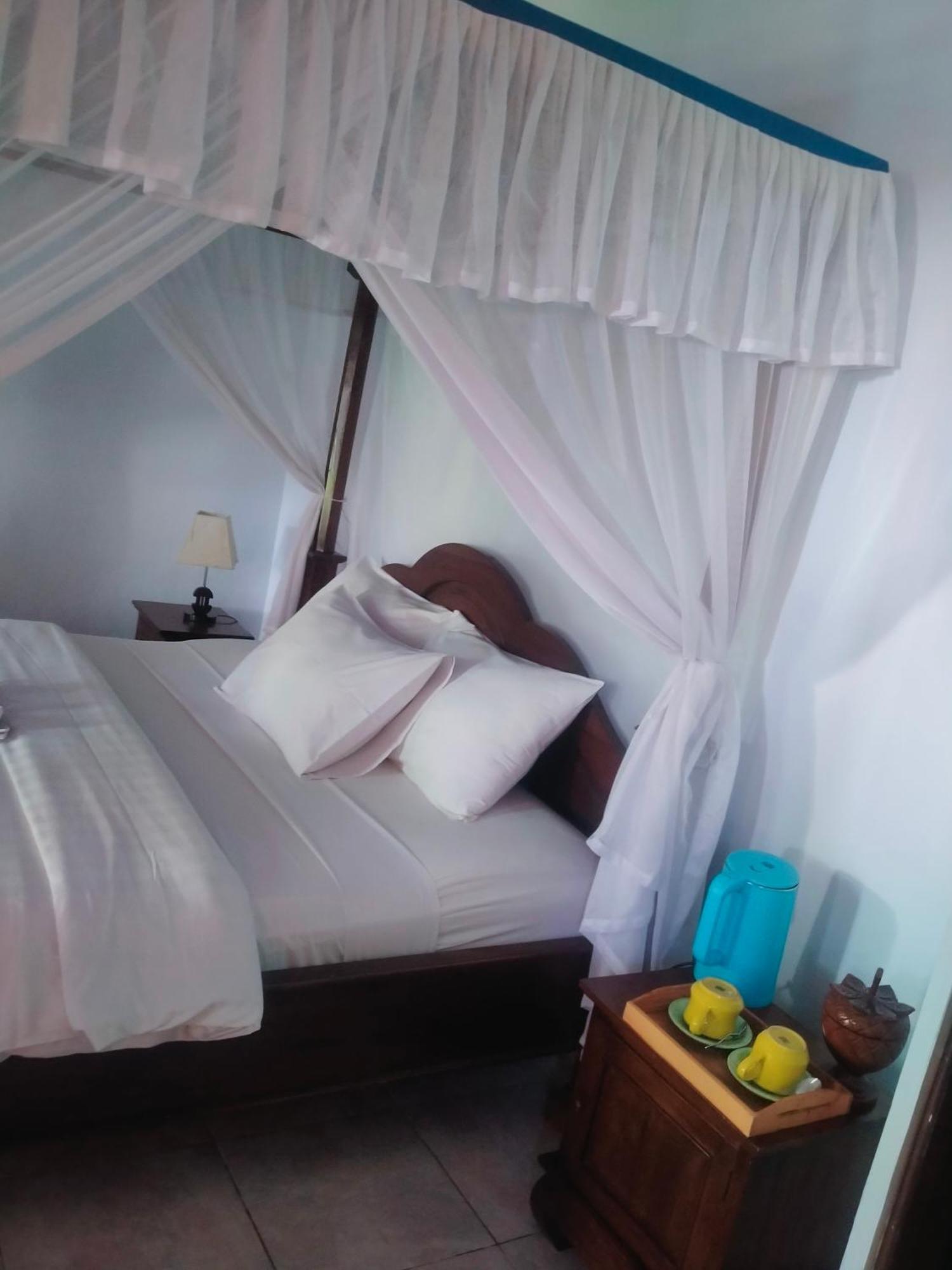 Coral Bay Bungalows Amed Quarto foto