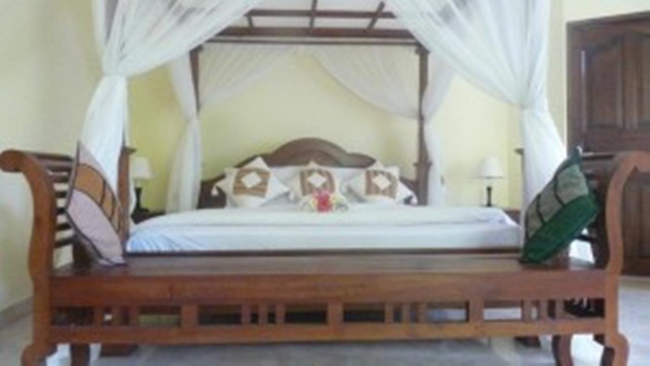 Coral Bay Bungalows Amed Exterior foto